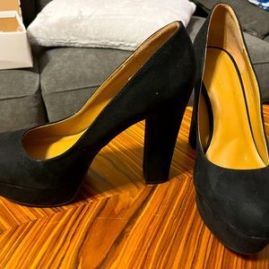 Black suede four inch pumps very sturdy but light and like brand new.